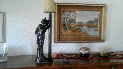Keramikfigur mit Lampe - turnthetime.de